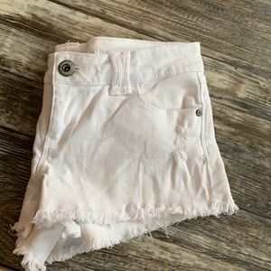 White distressed jean shorts